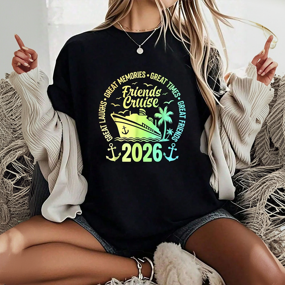 Person wearing a black sweatshirt with 'Friends Cruise 2026' design, sitting on a textured surface.