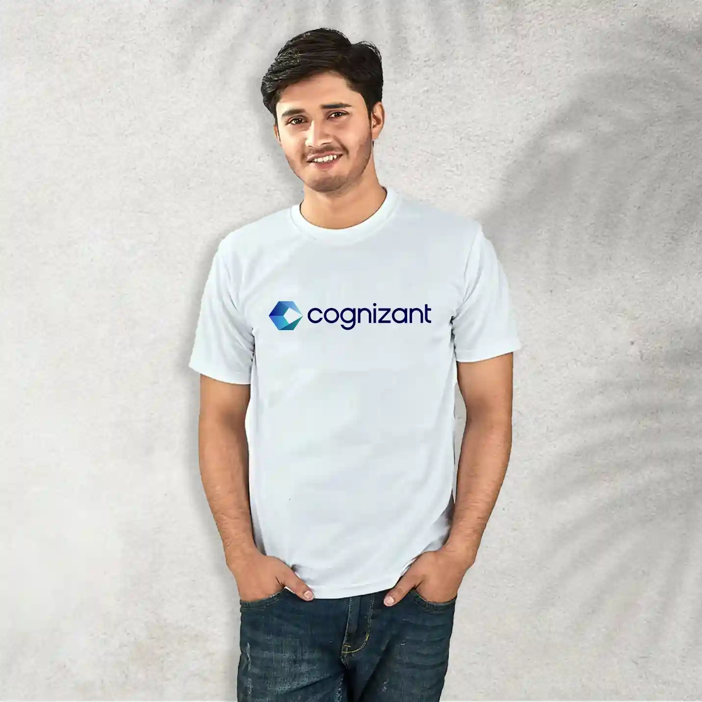 Person wearing a white t-shirt with Cognizant logo on a light gray background