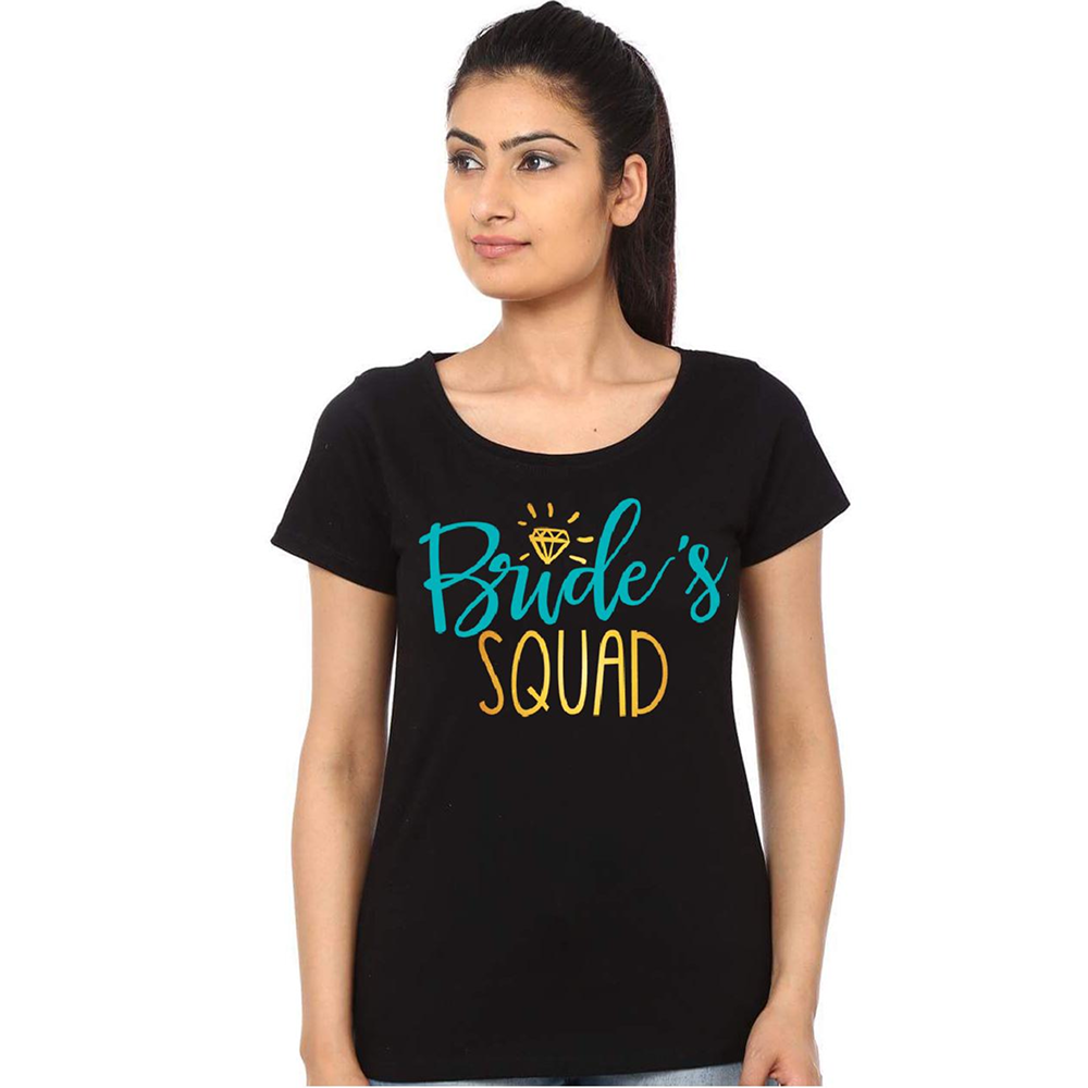 Woman wearing a black t-shirt with 'Bride's Squad' text on a white background