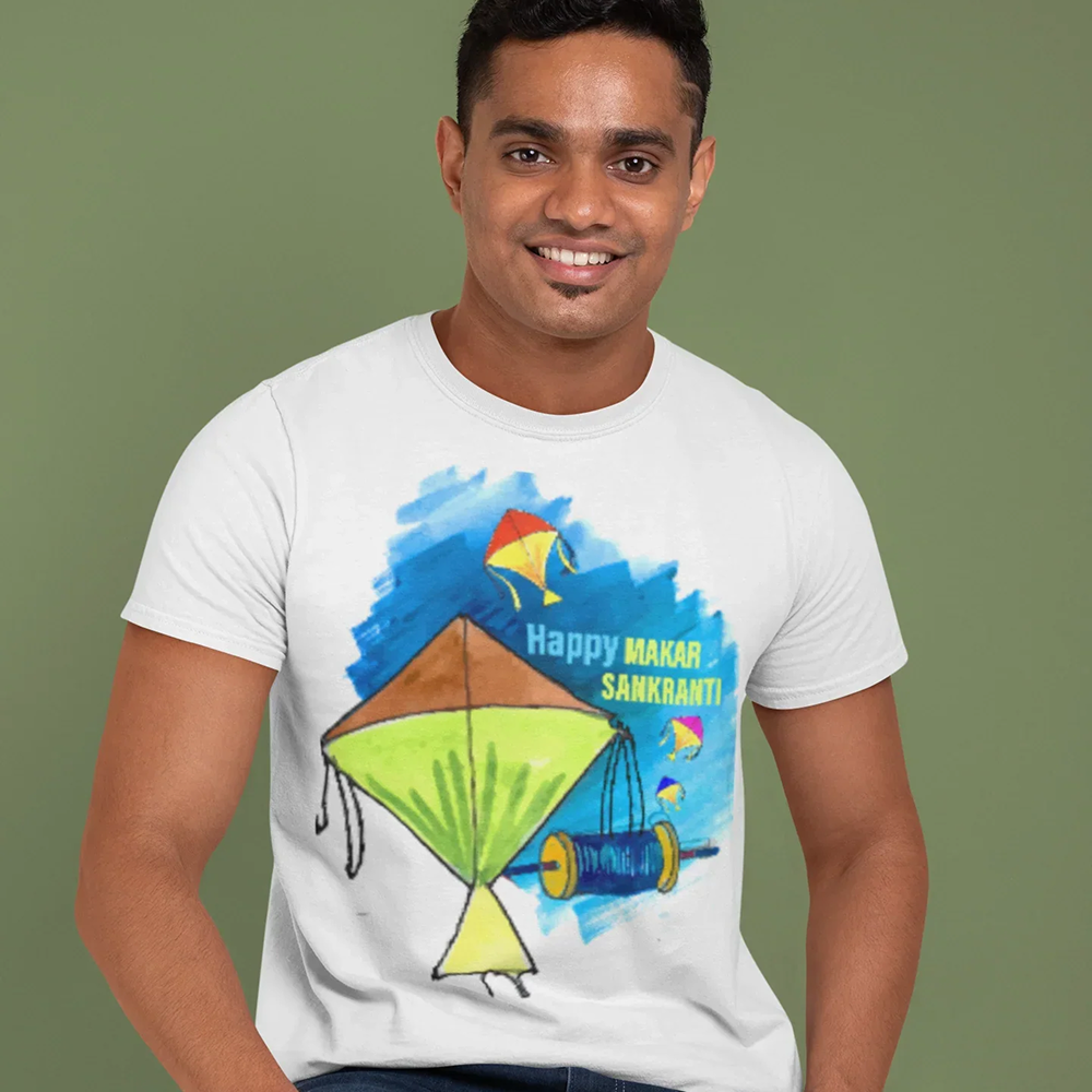 Man wearing a white t-shirt with a colorful kite design and text on a green background