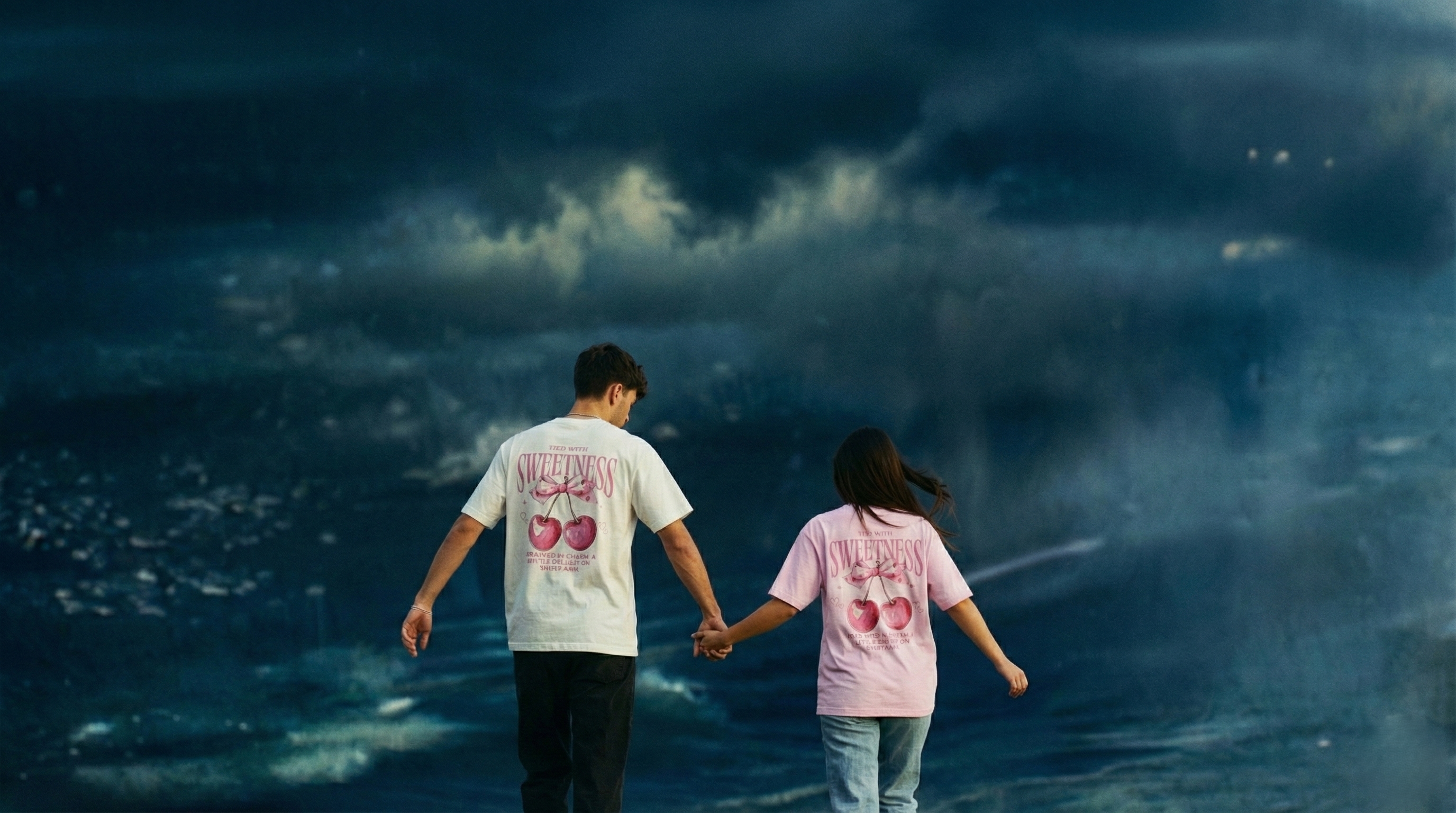 Picture showing couple wearing SCROLLFIT Oversized Tied with Sweetness Tee